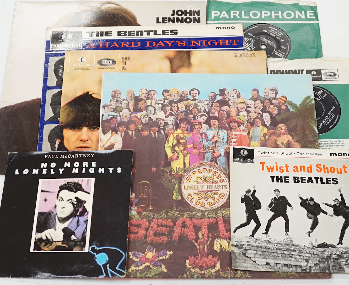 Four Beatles related LPs and four singles; Sgt Pepper, Beatles For Sale, A Hard Days Night, the John Lennon Collection, 7” singles; Day Tripper, Twist and Shout, I Want to Hold Your Hand, No More Lonely Nights